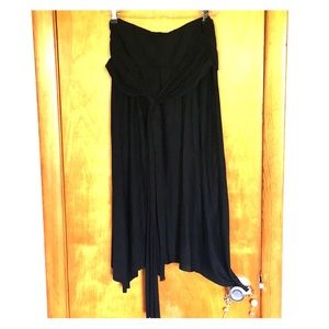 Sleeveless rich black dress with accent in front